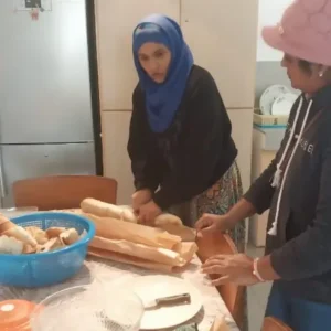 Simple acts like meal preparation bring warmth, dignity, and togetherness to those we serve.