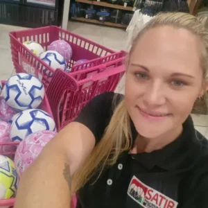 Nadia Coward from SATIB shopping for rugby, netball, and soccer balls for donation to Mtunzini Primary School.